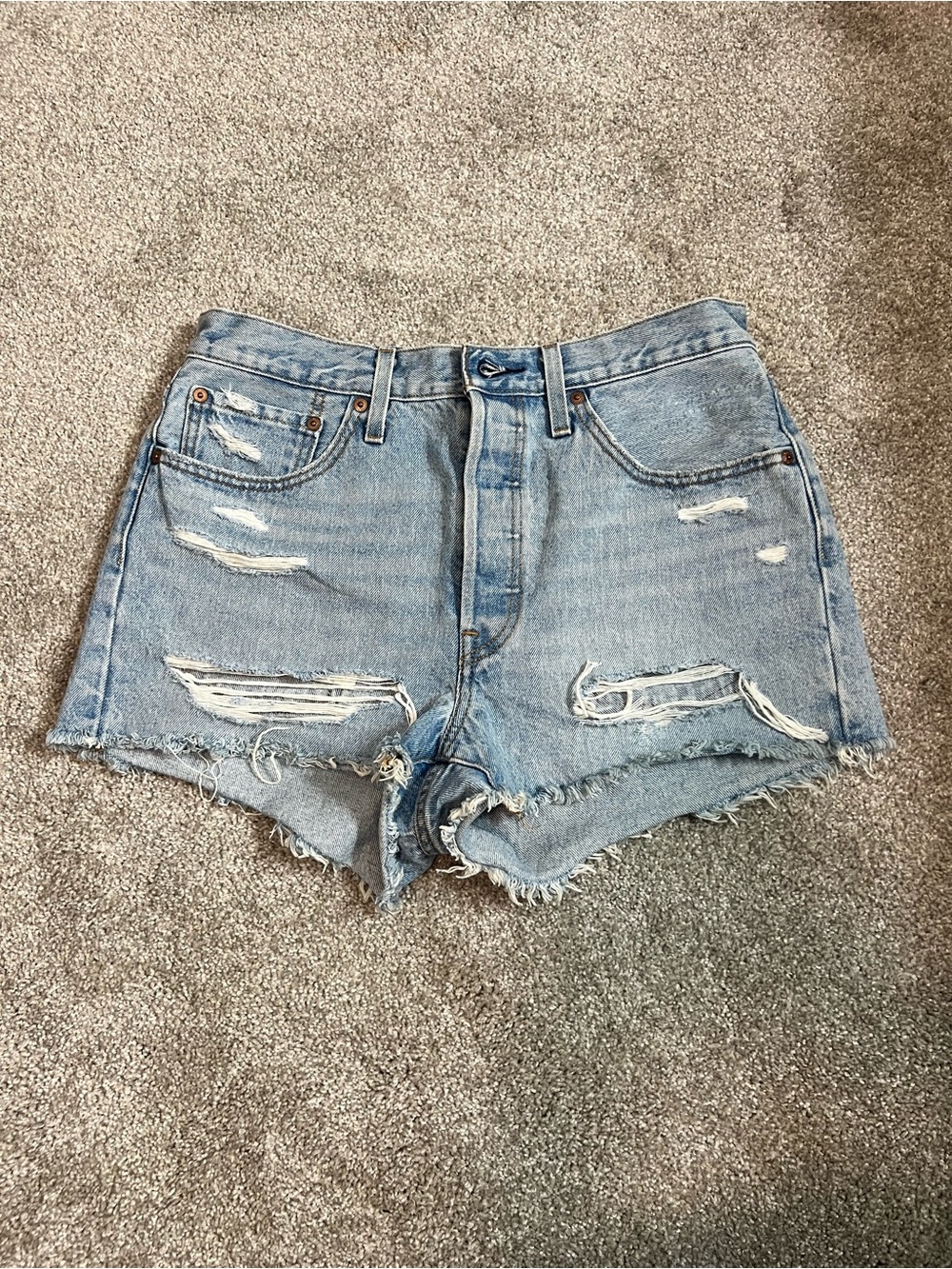 High-Rise Light Blue Distressed Denim Shorts